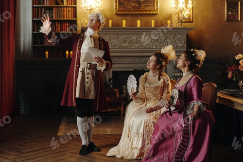 Preview: Caucasian Young Man Gesturing Dramatically near Caucasian Women in Baroque Setting
