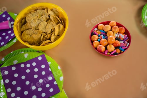 Preview: Confectioneries and decorated plates on a table
