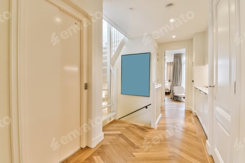 Preview: a long hallway with white walls and a blue door