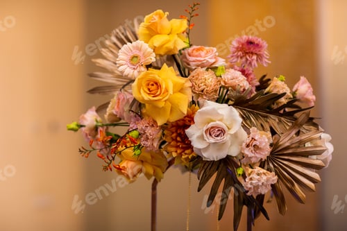 Preview: Beautiful flower composition with dry palm leaves, gerberas, white and yellow roses, carnations.