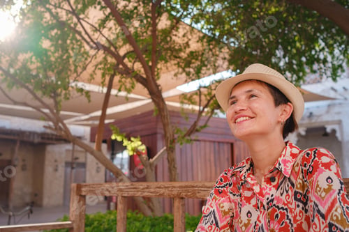 Preview: Young female tourist exploring iconic landmarks of the United Arab Emirates.