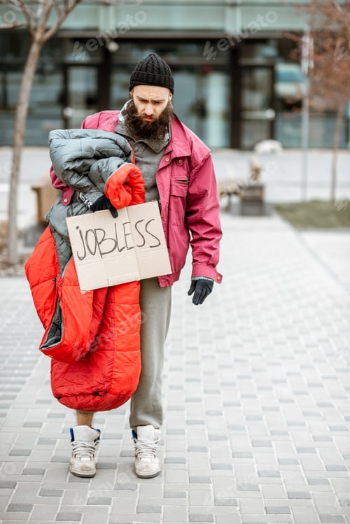 Preview: Homeless beggar near the business center