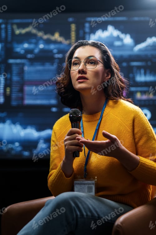 Preview: woman is giving a presentation at conference