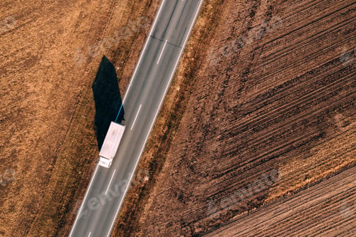 Preview: Aerial view of truck on the road