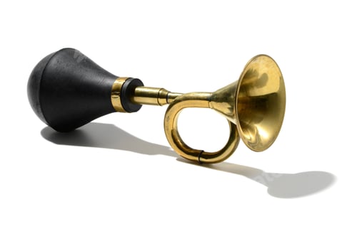 Preview: Vintage brass car horn against white background