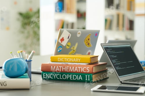 Preview: Stack of Books on Table in School Library