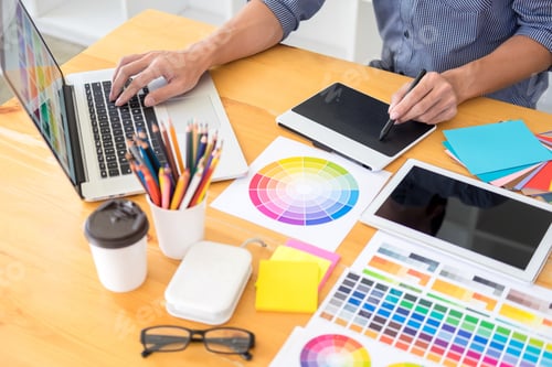 Preview: team interior designer drawing a new project using graphic computer and choosing Color swatch