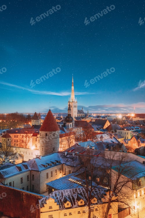 Preview: Tallinn, Estonia. Night Starry Sky Above Old Castle Walls Architecture. Cityscape Skyline In Old