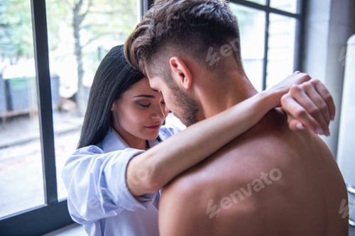 Preview: Sexy young couple in kitchen