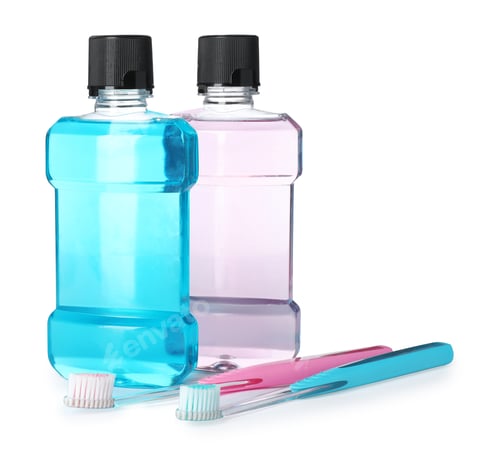 Preview: Mouthwash and other items for teeth care on white background