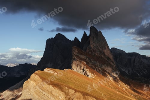 Preview: Into the darkness. Outstanding hills of the Seceda dolomite mountains at daytime