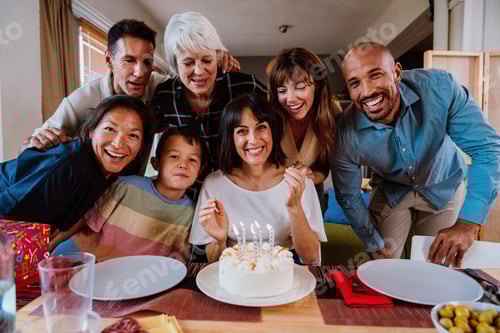 Preview: Family and friends reunion at home. Family celebrating birthday with cake.
