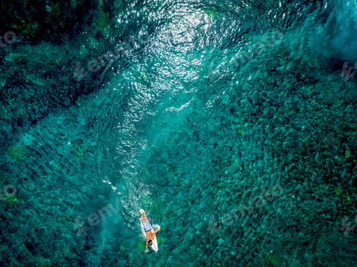 Preview: Surfers are surfing the waves. Nusa Lembongan is an island southeast of Bali