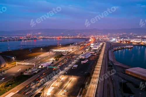 Preview: Aerial view of freeways in San Francisco Bay during rush hour at dusk
