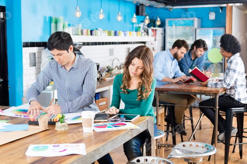 Preview: People working office sitting desk modern open coworking space mix race colleagues