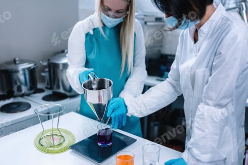 Preview: Two Female Candle Makers Pouring Wax
