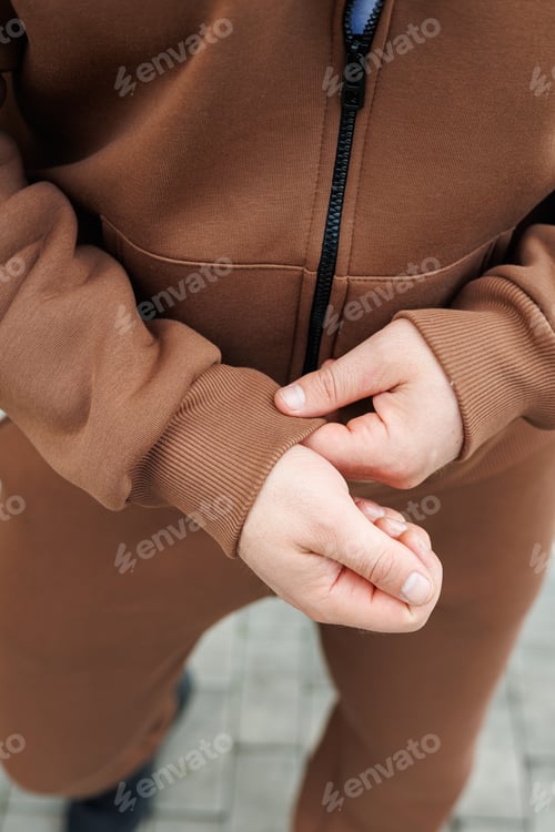 Preview: Man in brown casual warm suit. Men's fleece suit for cold walks. Men's fashion.