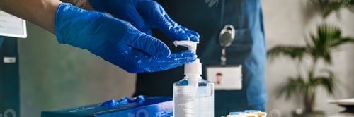 Preview: Close up of two doctors sterilizing hands before surgery