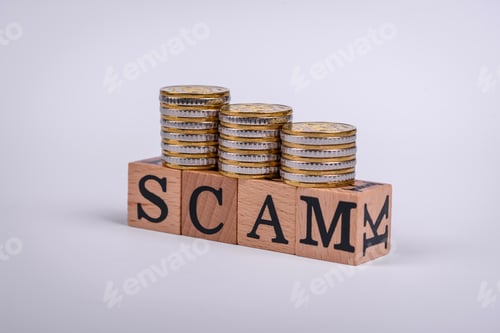 Preview: The inscription Scam made of wooden cubes on a plain background
