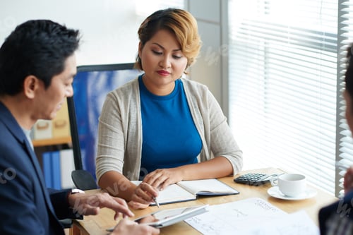 Preview: Businesswoman Asking Colleague about His Idea