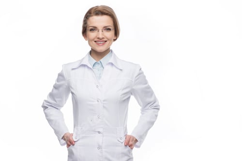 Preview: Smiling Woman in Lab Coat Posing on White