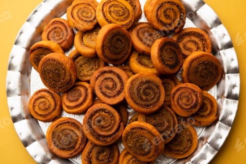 Preview: Indian Fried Bhakarwadi Tea Time Snack also known as bakarwadi, bakarvadi, bakar vadi or spring roll