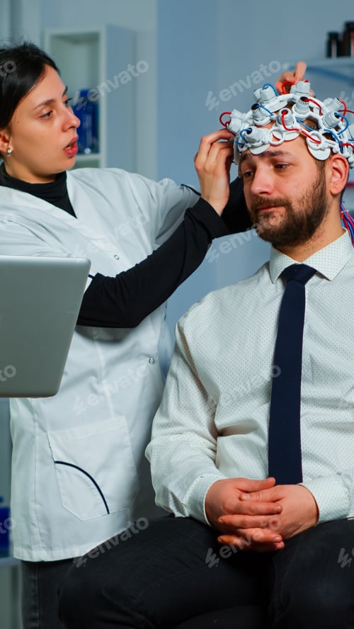 Preview: Team neurological researchers working together developing treatment