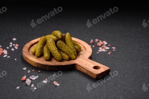 Preview: Delicious small pickled cucumbers gherkins with onions, mustard, salt and spices