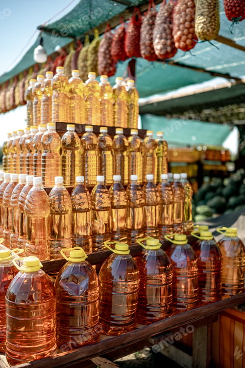 Preview: Bottles of sunflower oil on the market counter