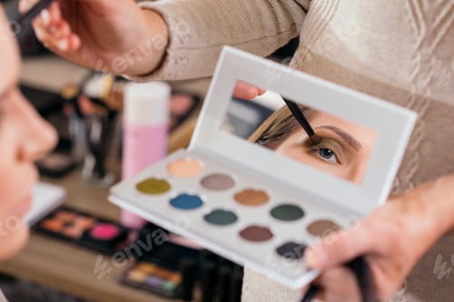 Preview: Make up artist applying eyeshadows
