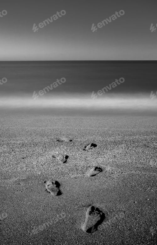 Preview: footprints on the beach and Sea black and white