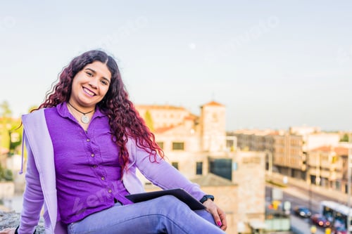 Preview: Cheerful Latin woman traveler person. Happiness tourist lifestyle in summertime in Spain, Europe