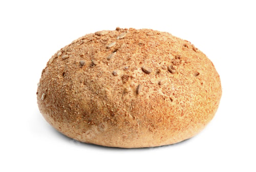 Preview: Loaf of fresh bread with sunflower seeds on white background