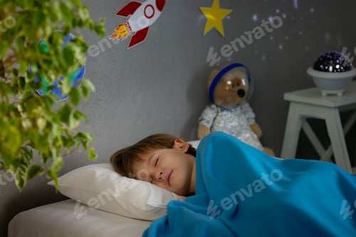 Preview: Happy child sleeping at home