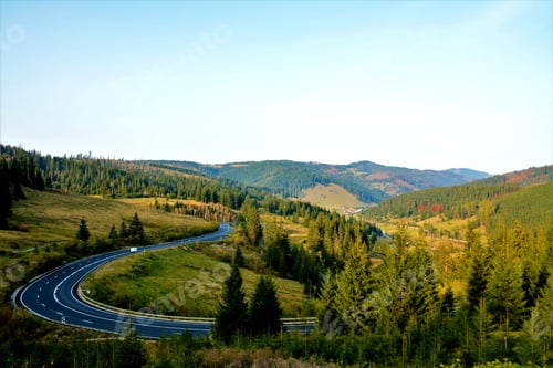 Preview: Mountain landscape view of the Mestecanis pass in Romania on a clear sky background
