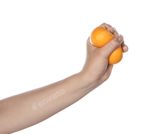 Preview: Woman squeezing antistress ball on white background, closeup