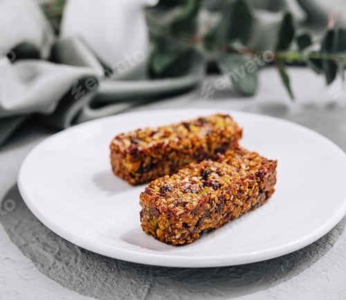 Preview: Two granola bar on white plate