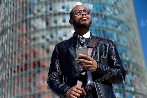 Preview: Trendy man using smart phone