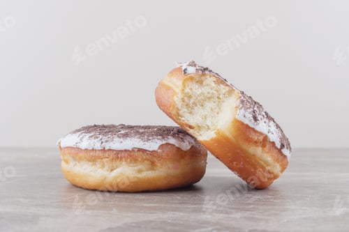 Preview: Two glazed donuts on marble background