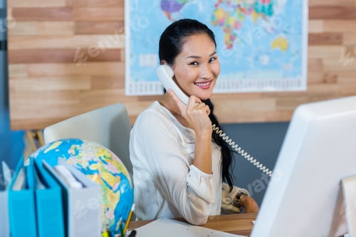 Preview: Pretty Businesswoman Having Phone Call In The Office