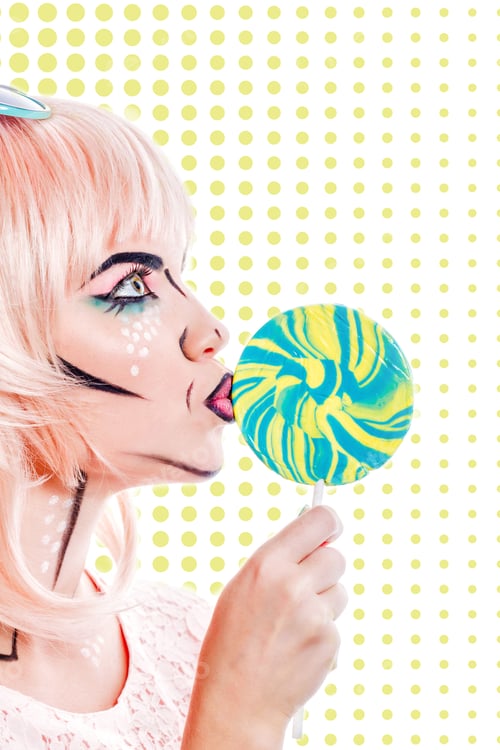 Preview: Girl With Creative Makeup In The Style Of Pop Art Holding Lollipop And Kisses Him. Colorful