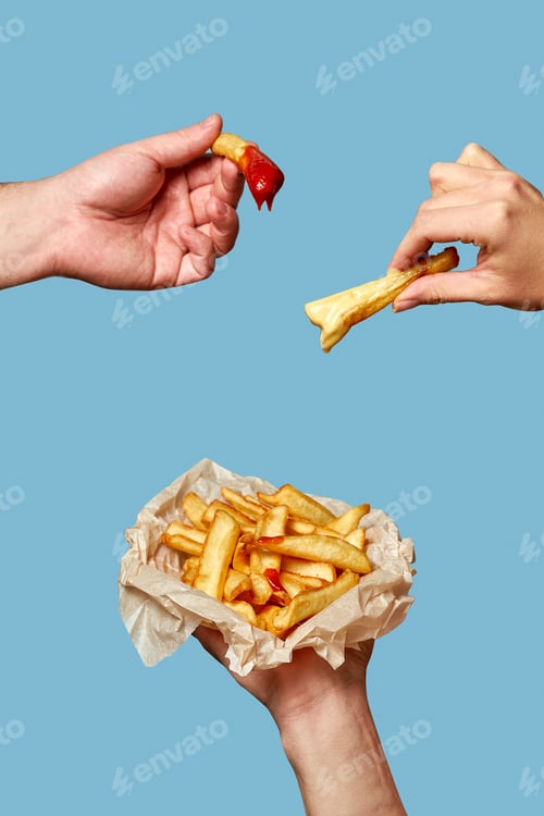 Preview: Hands dip potato dips in the sauce. Creative poster on blue background