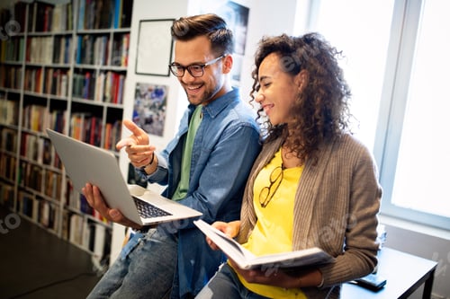Preview: Group of college students studying in the school library