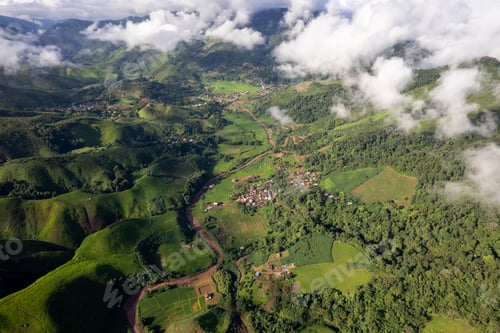 Preview: Landscape of Morning Mist with Mountain Layer. mountain ridge and clouds in rural jungle bush forest