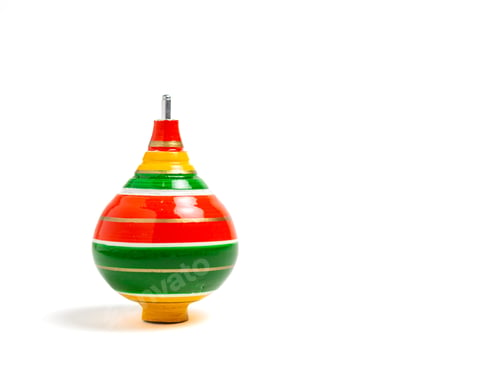 Preview: Colorful Detailed Wooden Spinning Top Isolated on white background. Nostalgic Toy Object