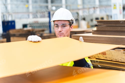 Preview: professional technician engineer working in industrial manufacturing factory