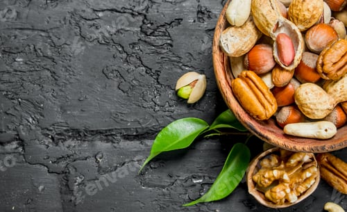 Preview: Different types of nuts in bowl.