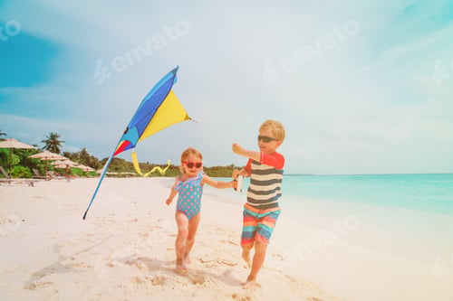 Preview: Kids- Little Boy And Girl- Flying A Kite On Tropical Beach