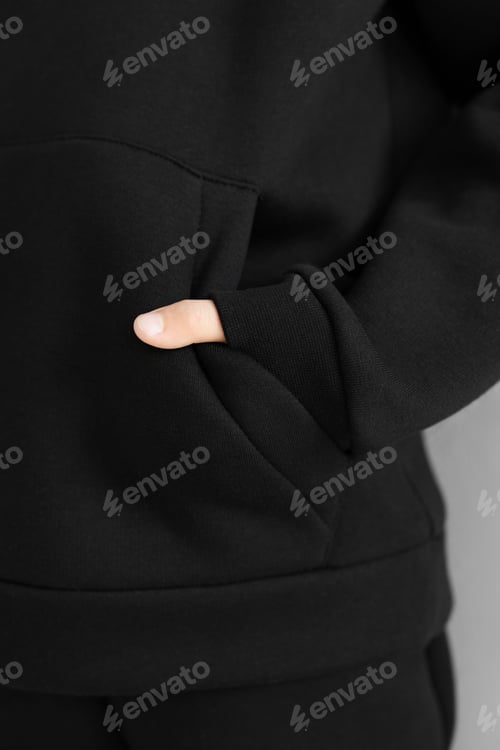 Preview: Black hooded loungewear set with pocket and cuffs.