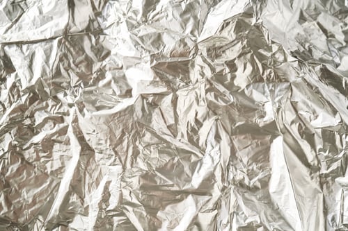 Preview: Abstract background made of crumpled silver foil.